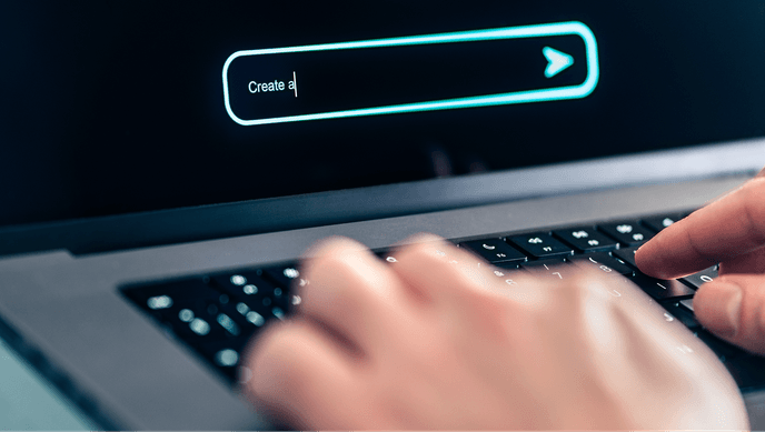 Hands typing on a keyboard, writing a generative AI prompt on a computer screen