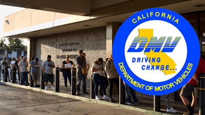 People in line outside of a DMV office